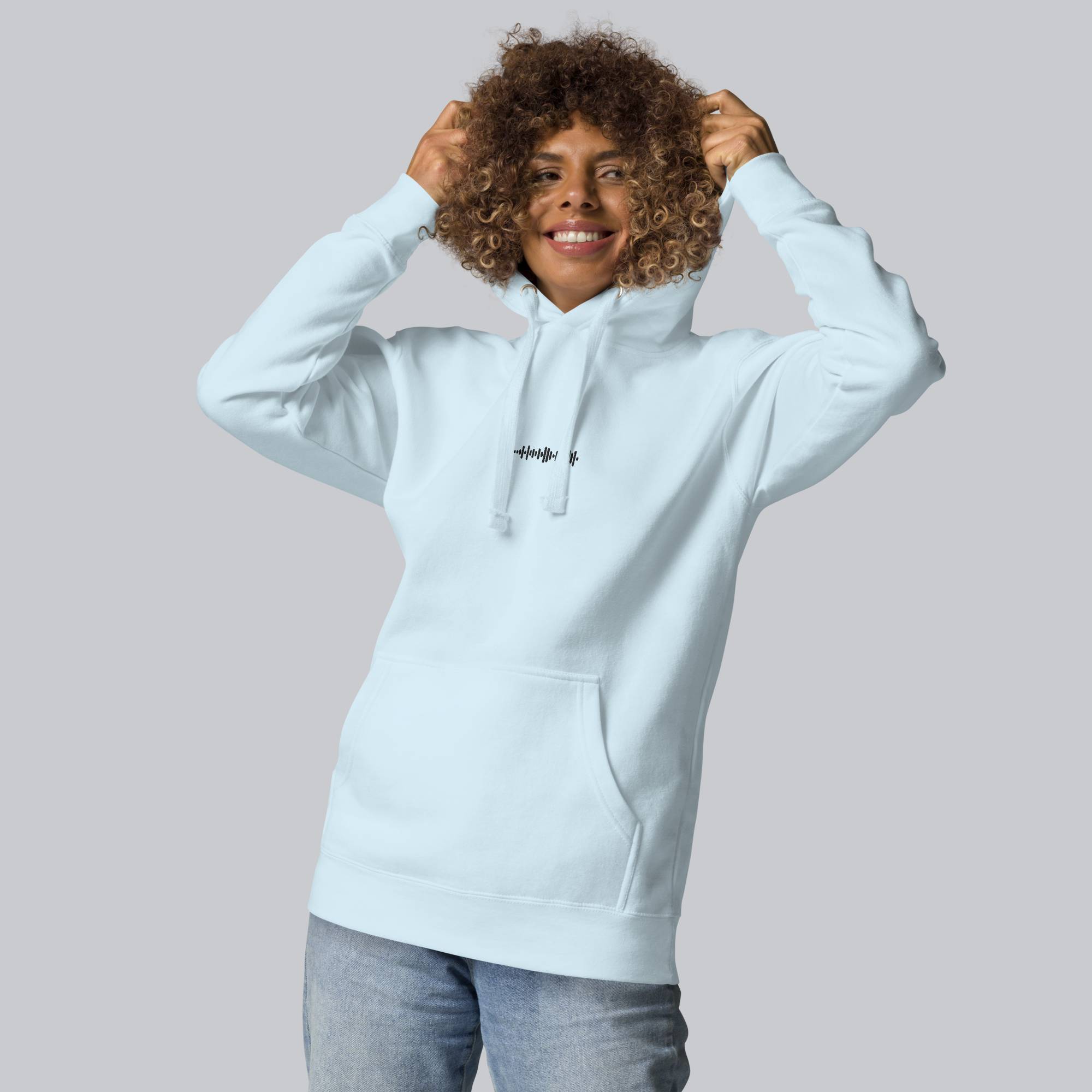 Light blue hoodie with a custom Music Code