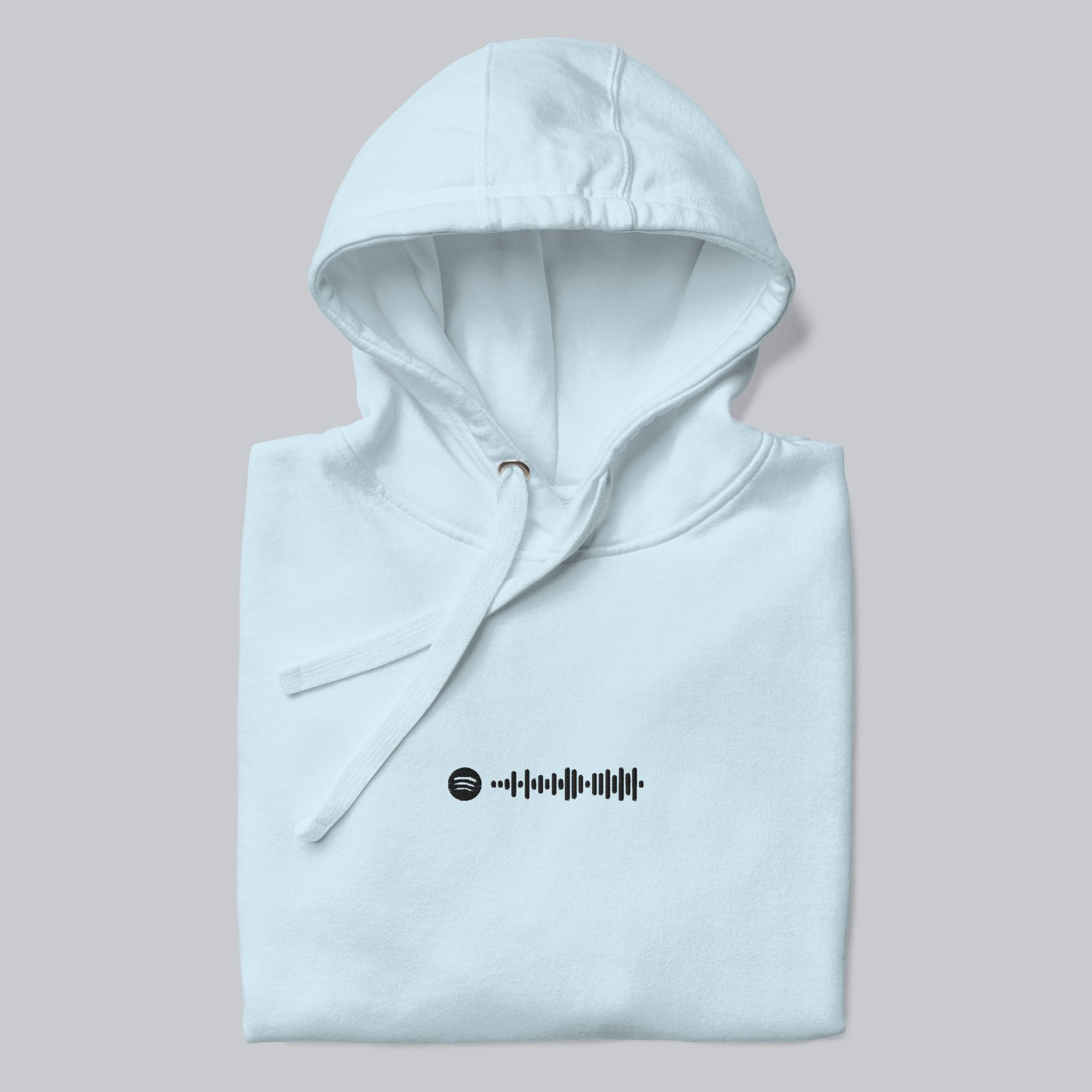 Light blue hoodie with a custom Music Code