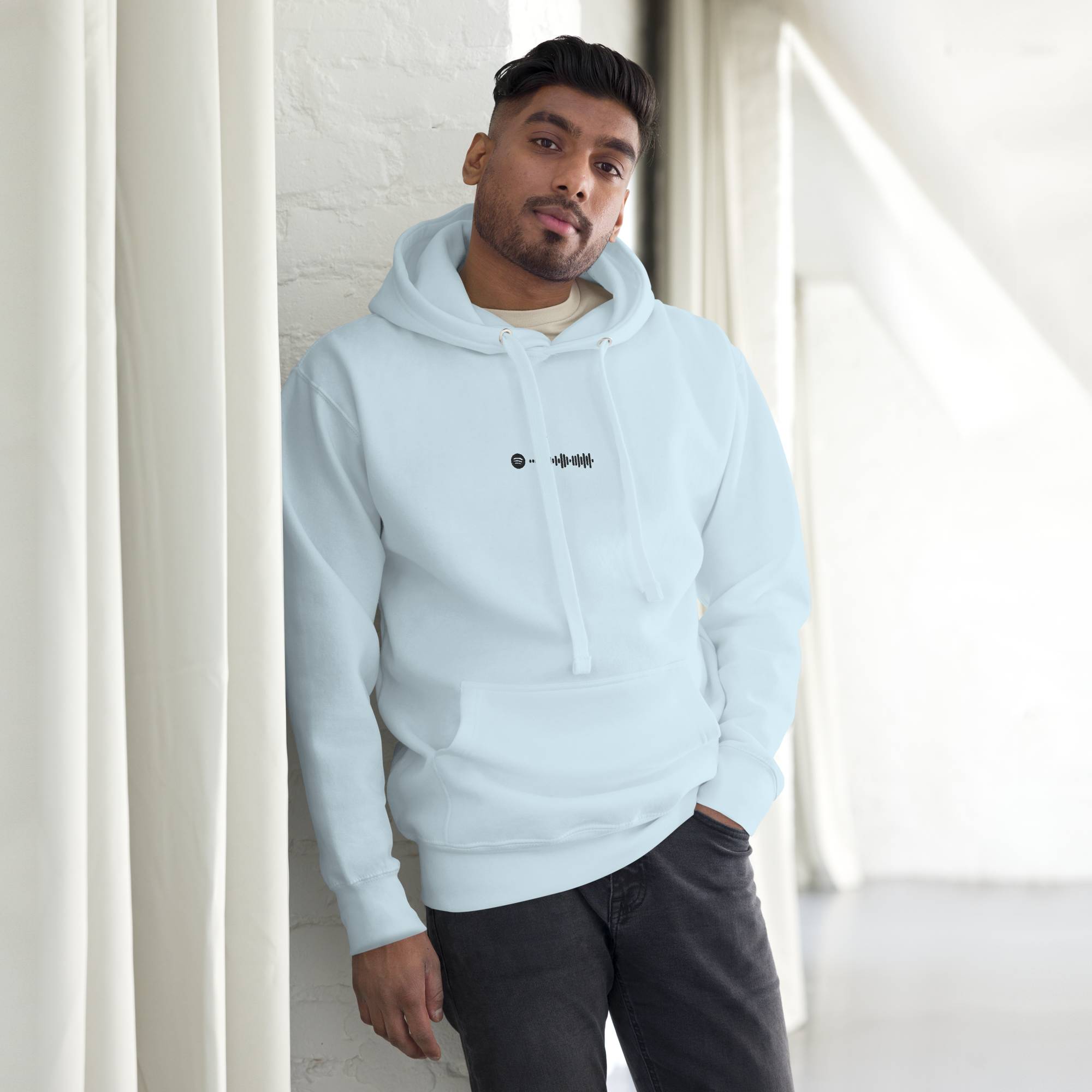 Light blue hoodie with a custom Music Code
