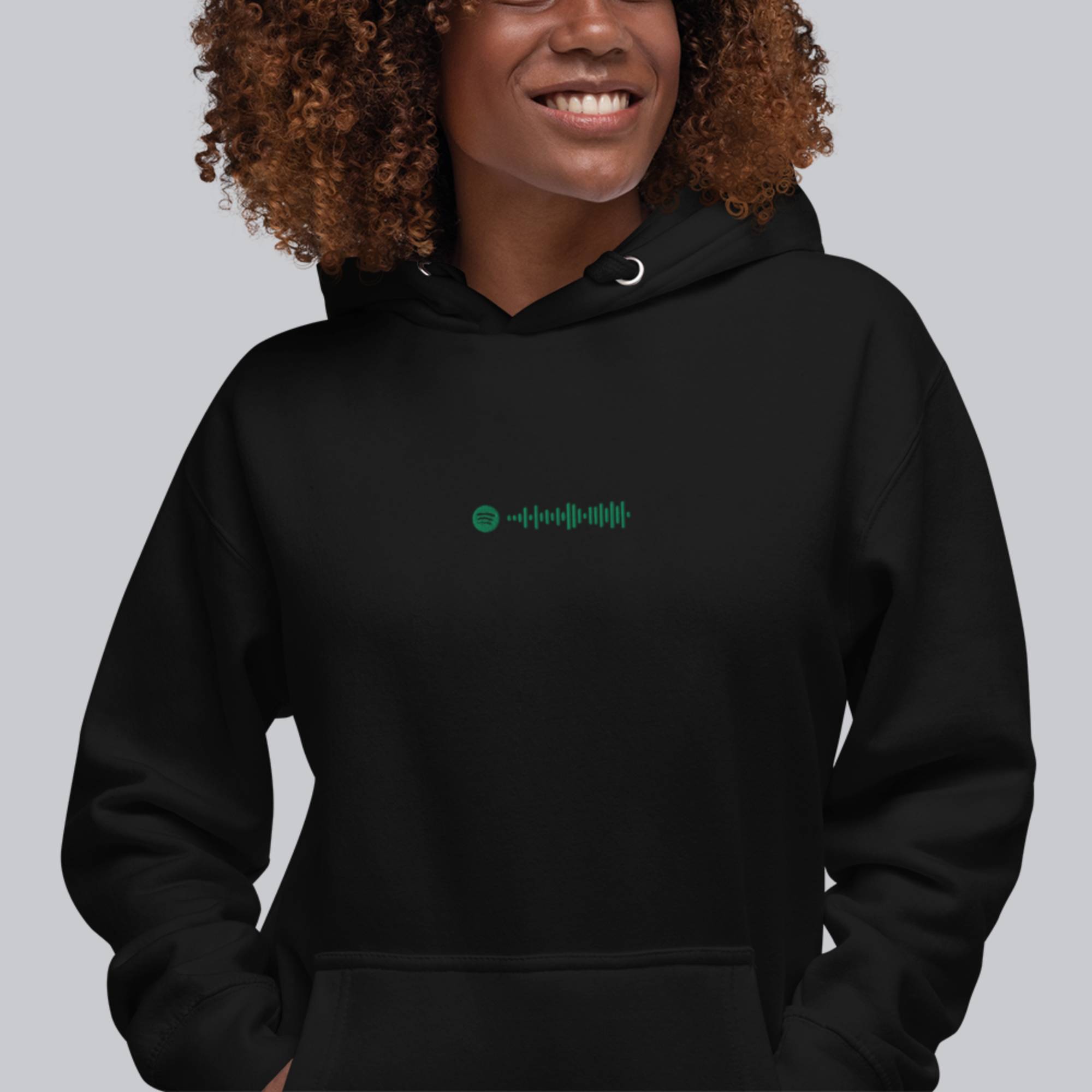Black hoodie with a custom Music Code