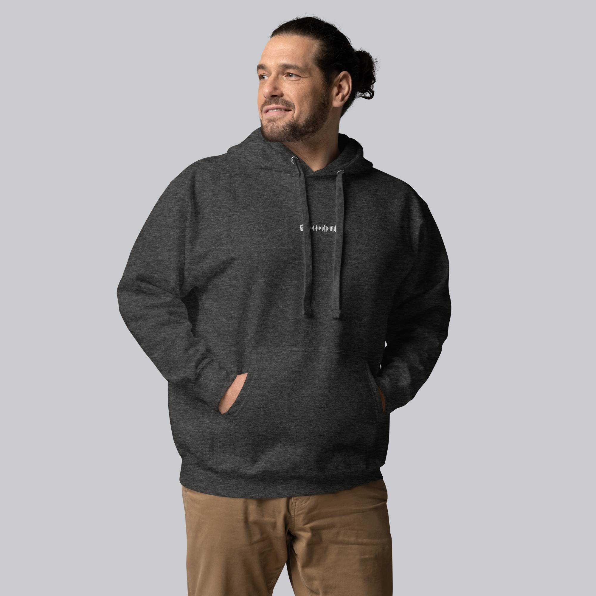 Dark grey hoodie with a custom Music Code