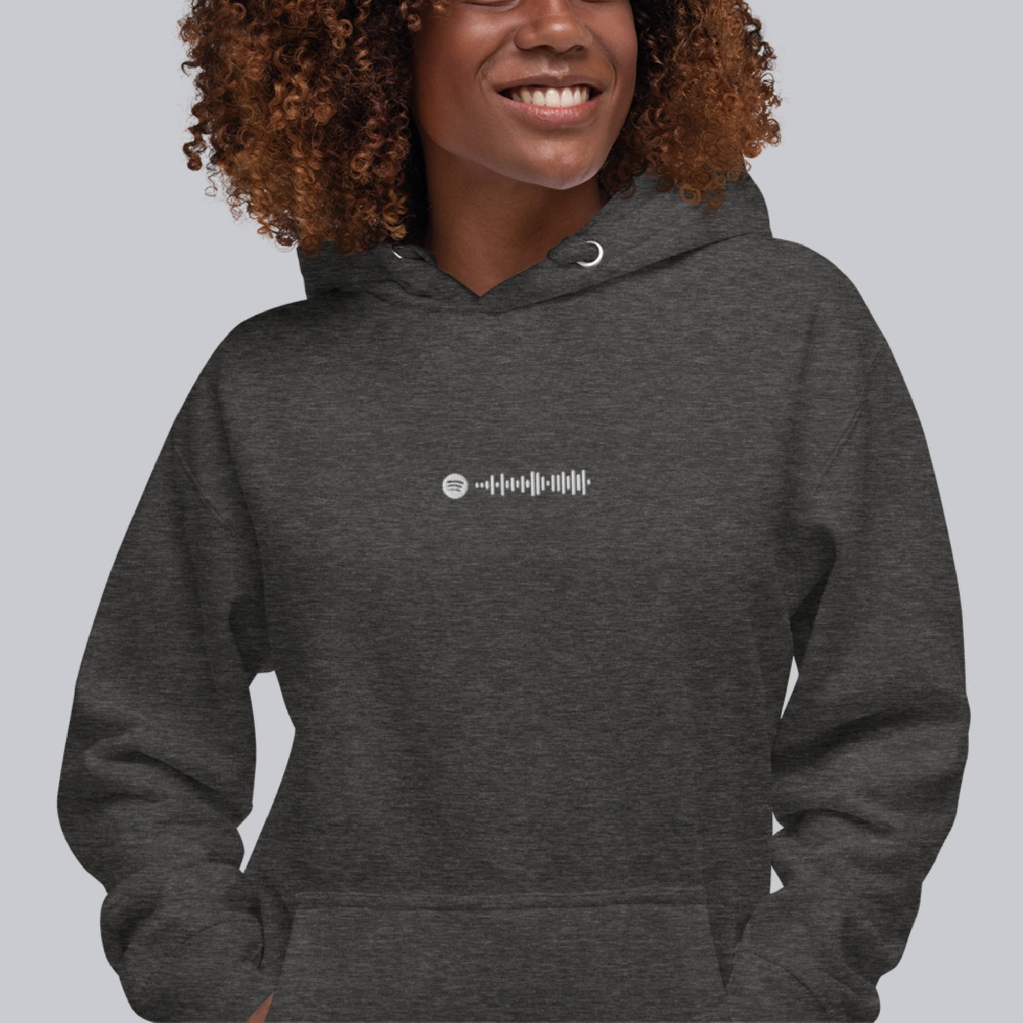 Dark grey hoodie with a custom Music Code