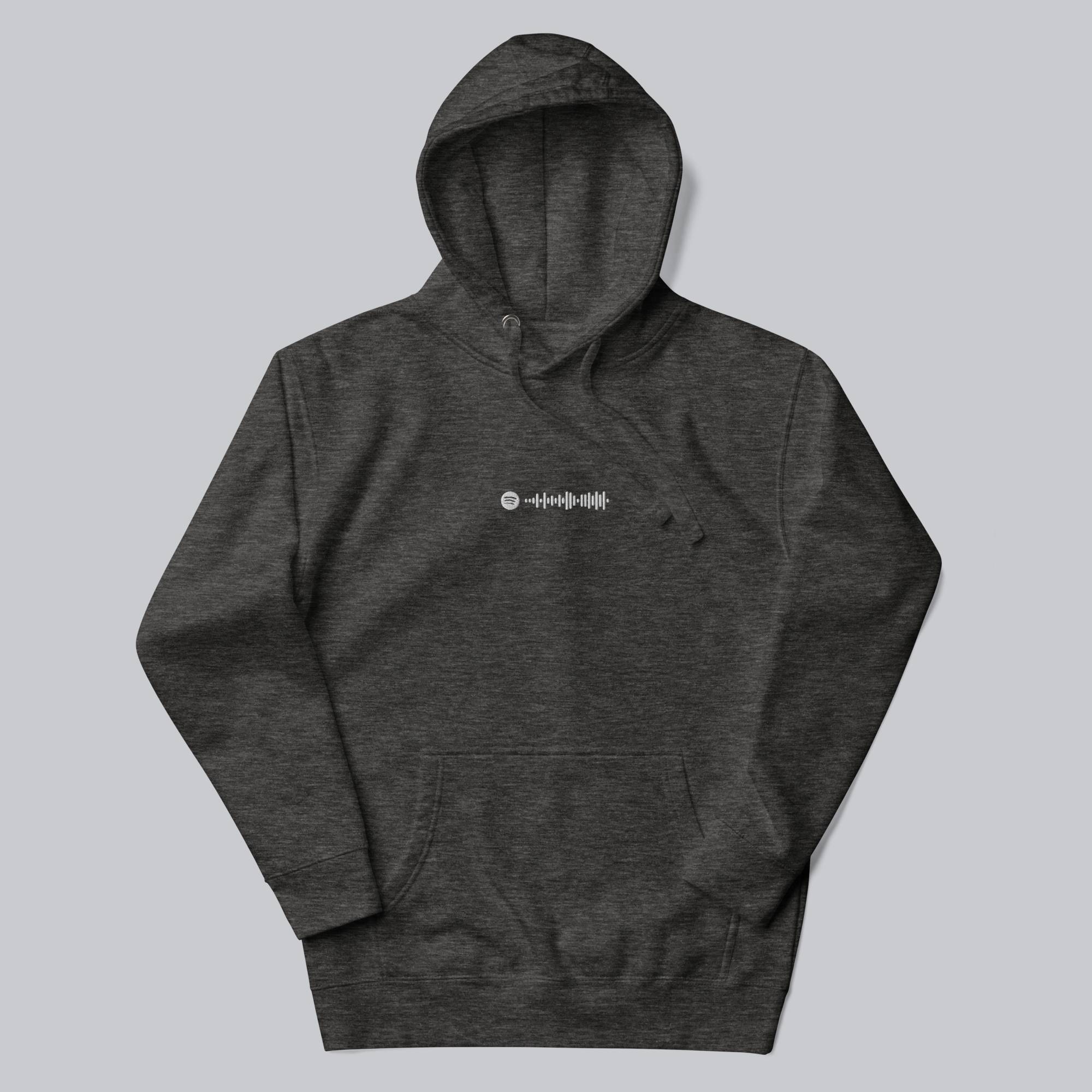 Dark grey hoodie with a custom Music Code
