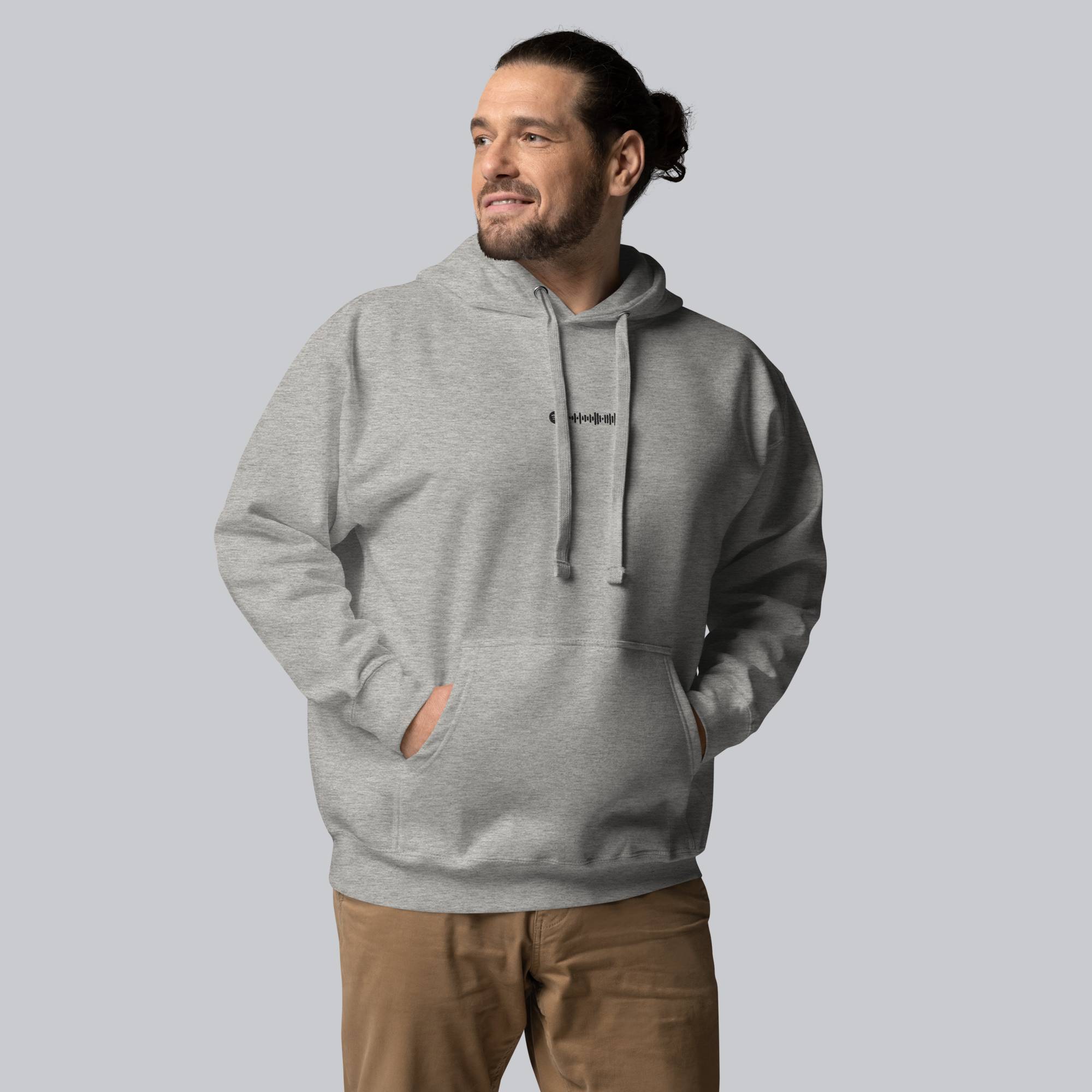 Grey hoodie with a custom Music Code