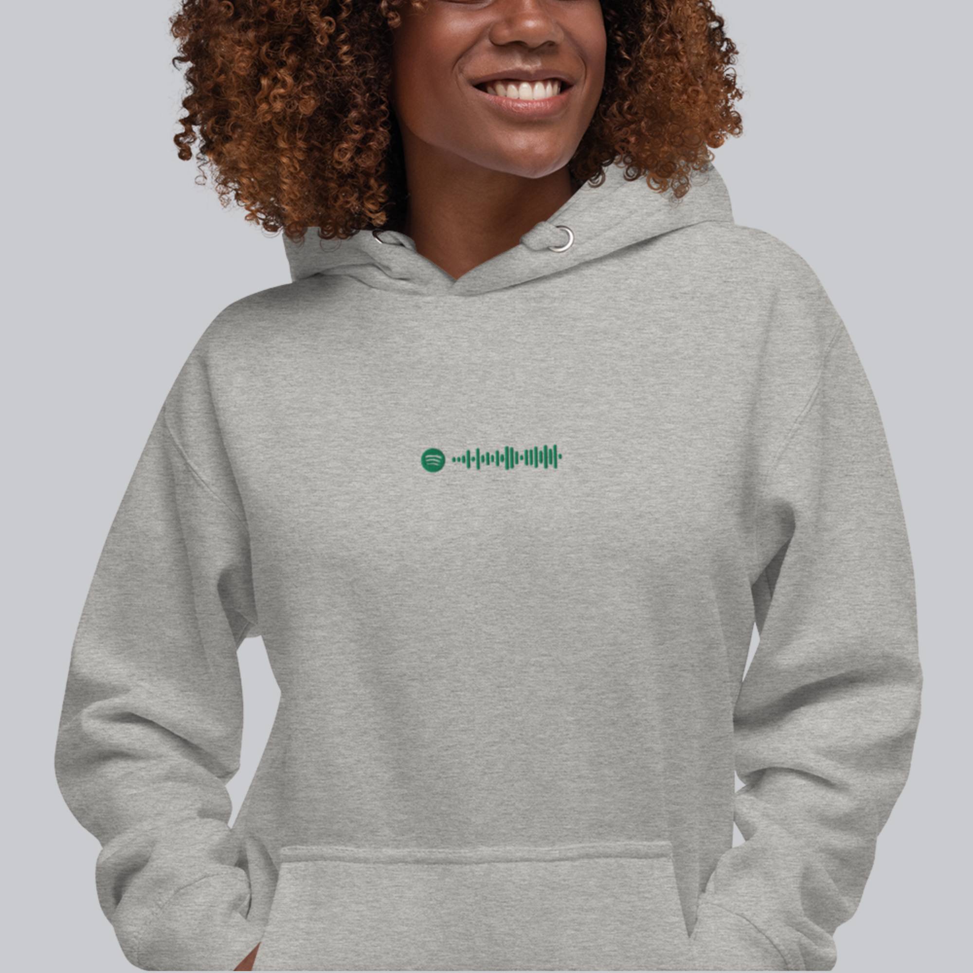 Grey hoodie with a custom Music Code