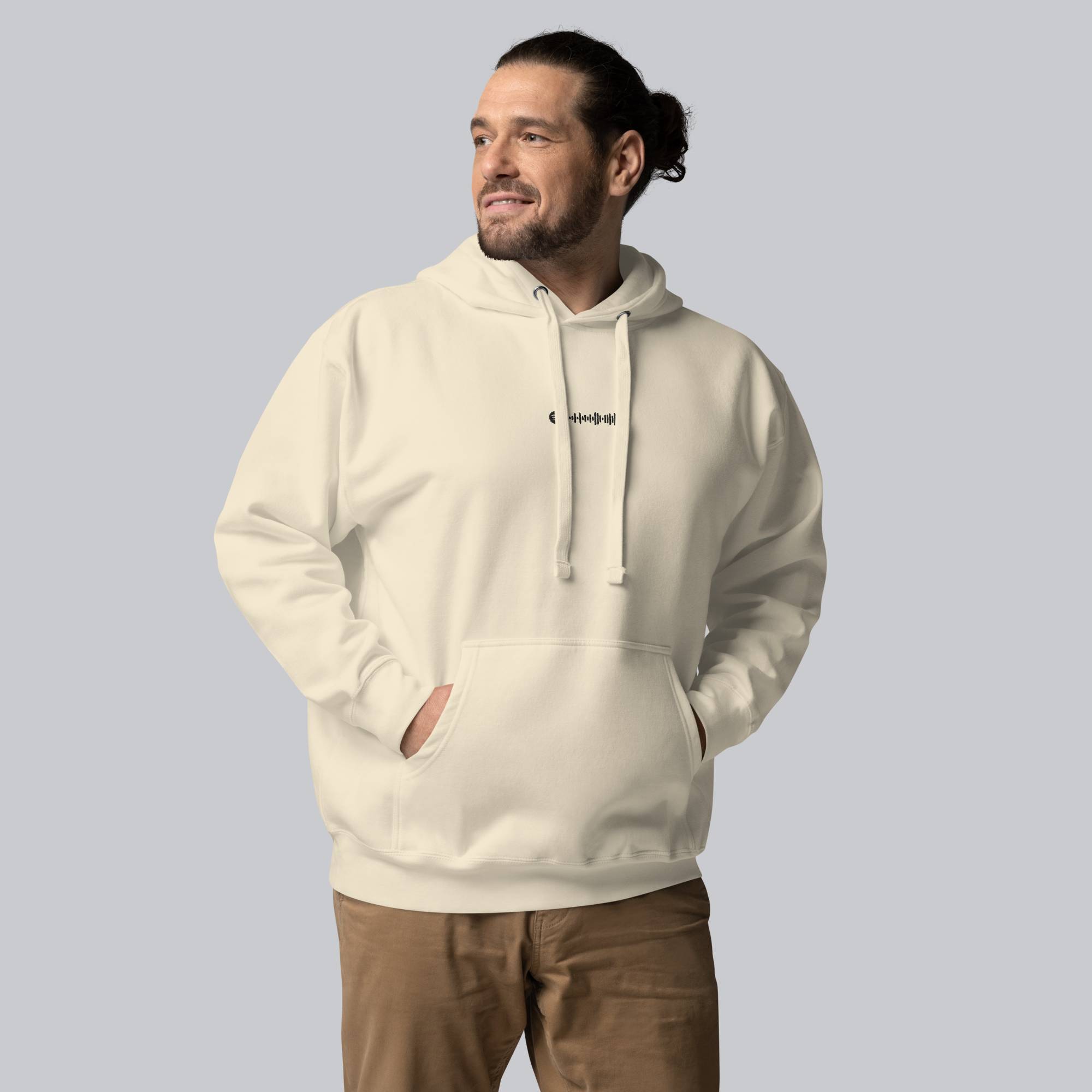 Light yellow hoodie with a custom Music Code
