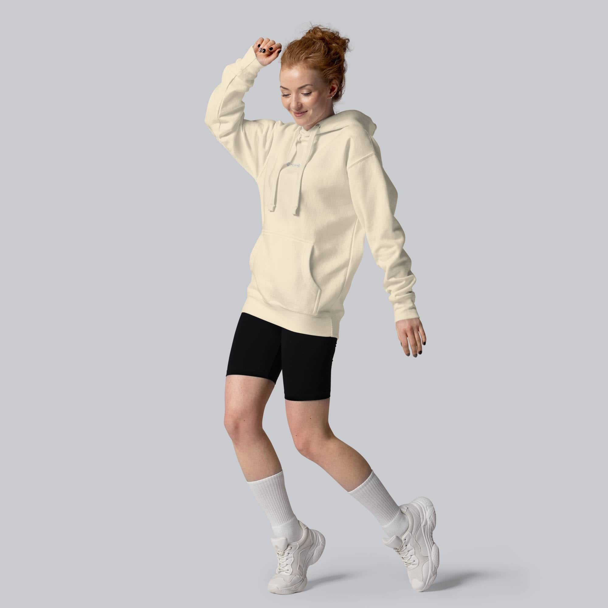 Light yellow hoodie with a custom Music Code