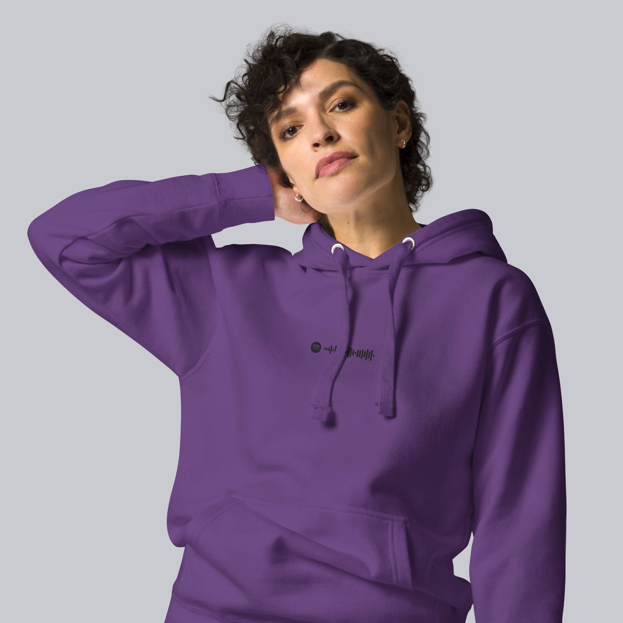 Purple hoodie with a custom Music Code