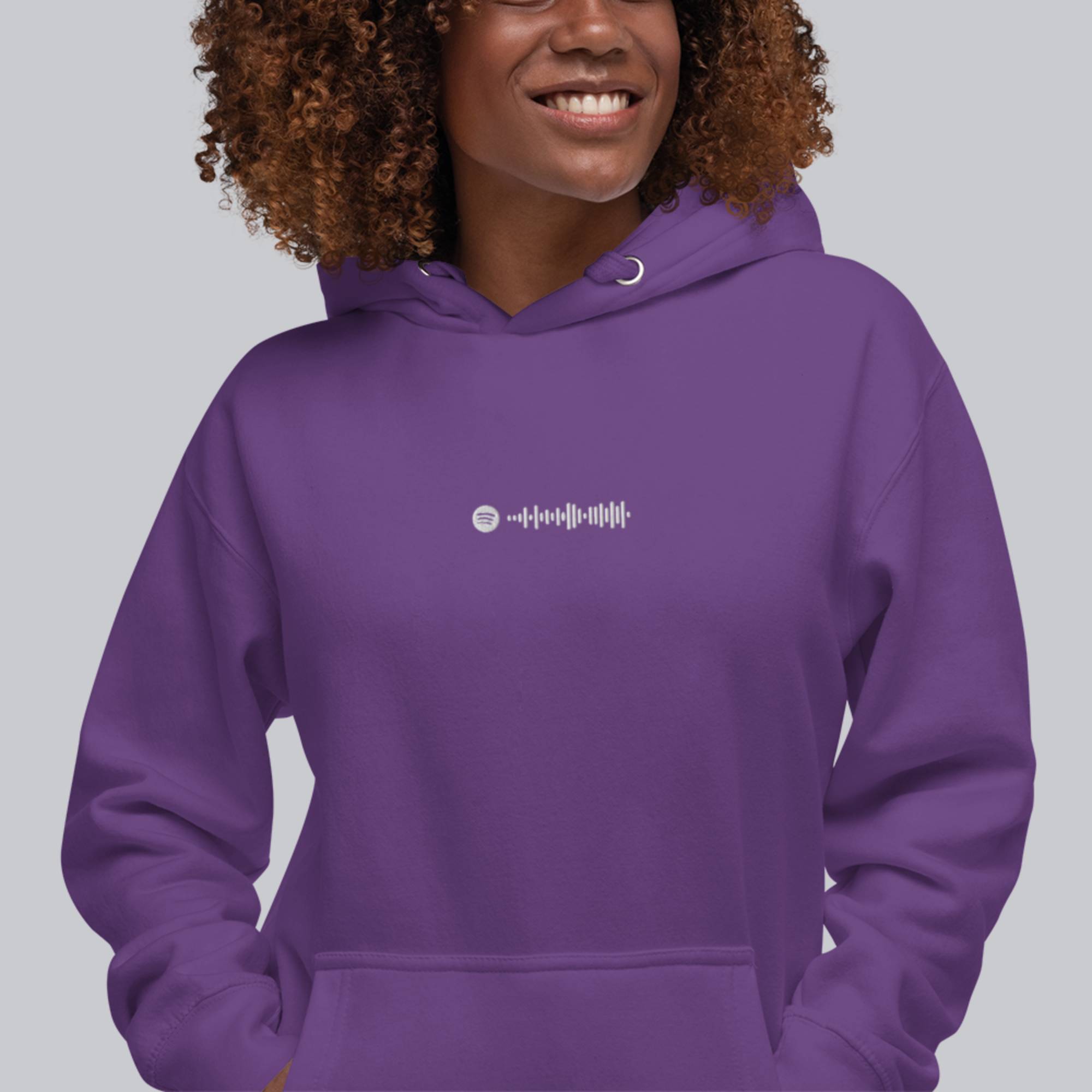 Purple hoodie with a custom Music Code