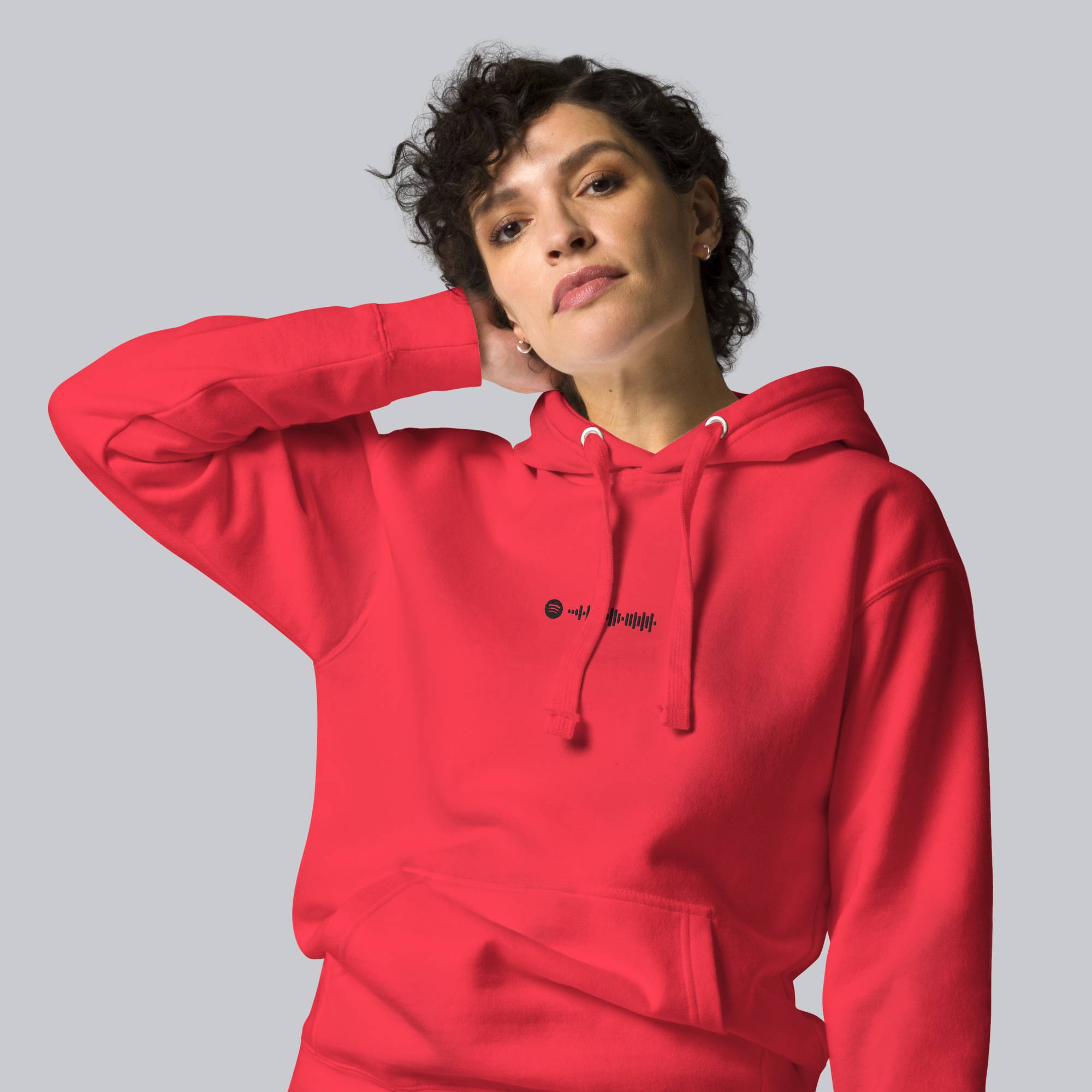 Red hoodie with a custom Music Code