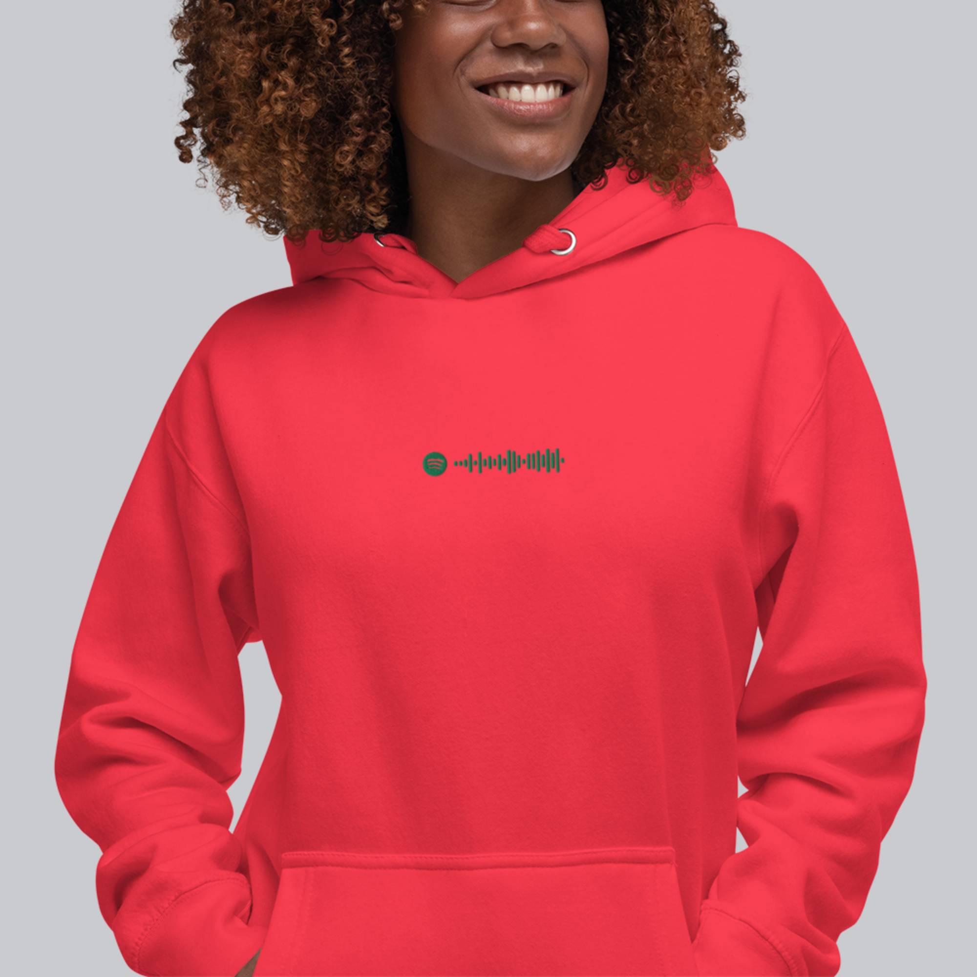 Red hoodie with a custom Music Code