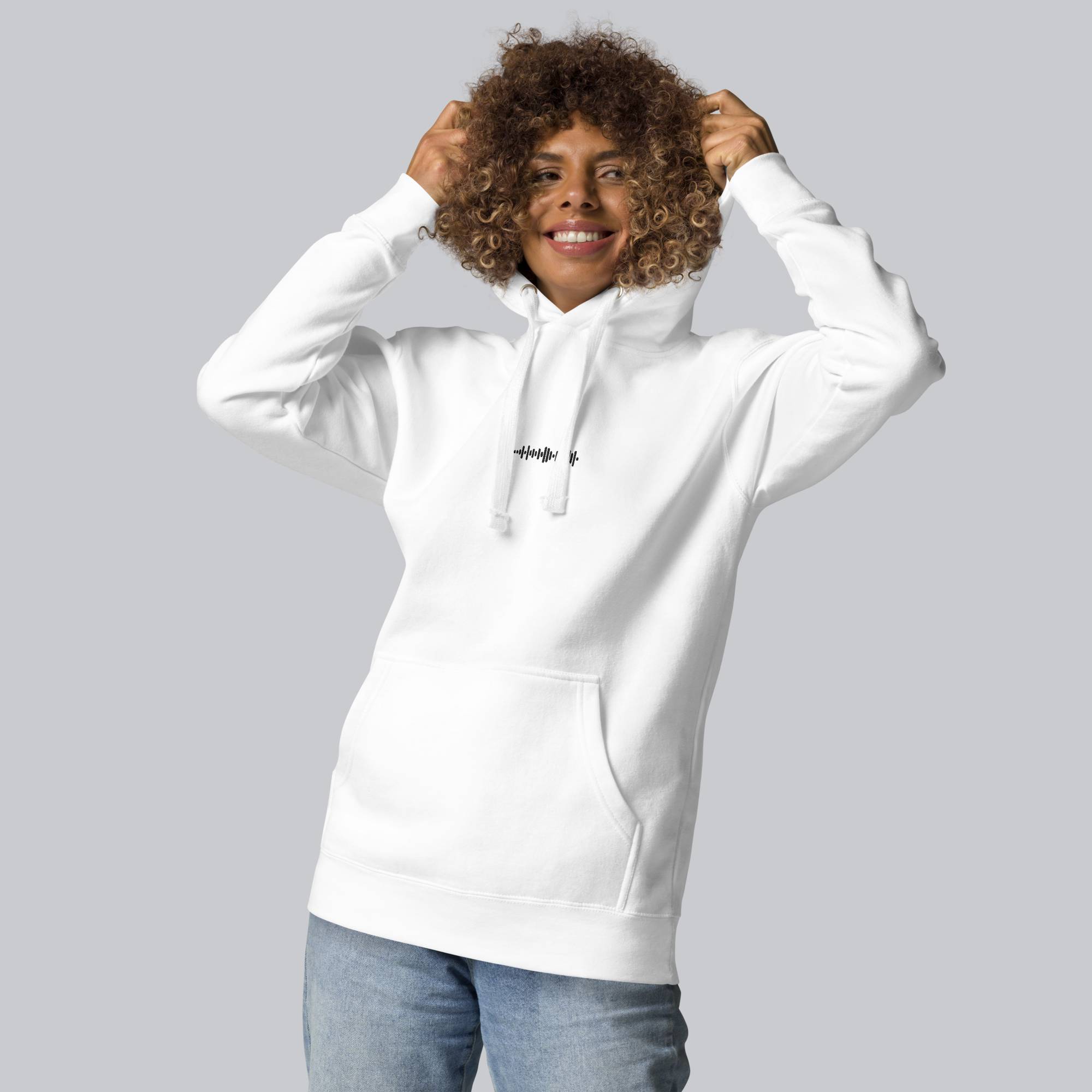 White hoodie with a custom Music Code
