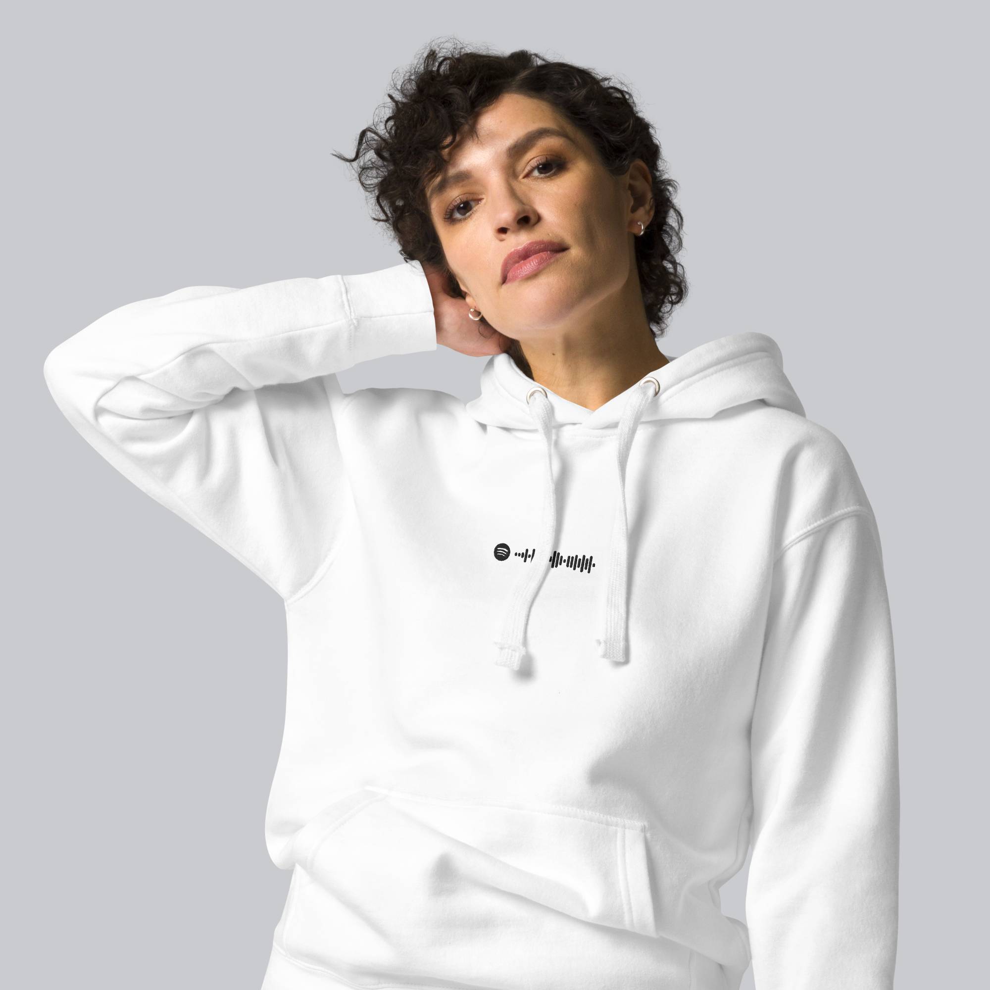 White hoodie with a custom Music Code