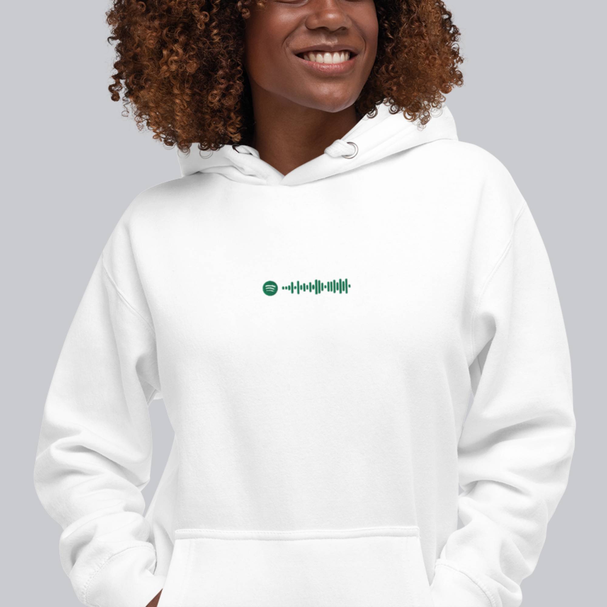 White hoodie with a custom Music Code