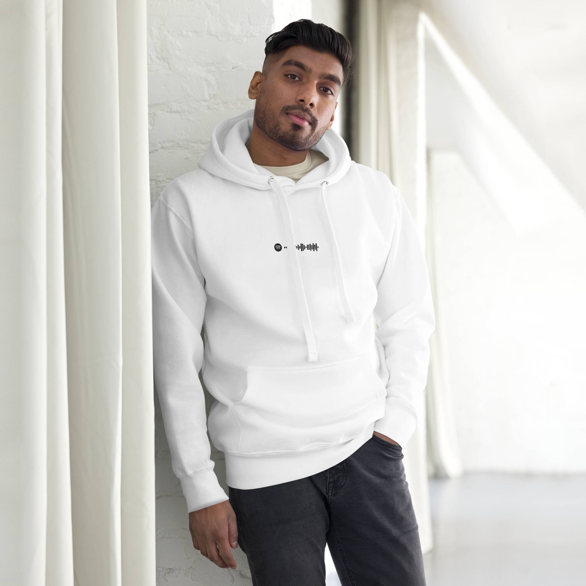 White hoodie with a custom Music Code