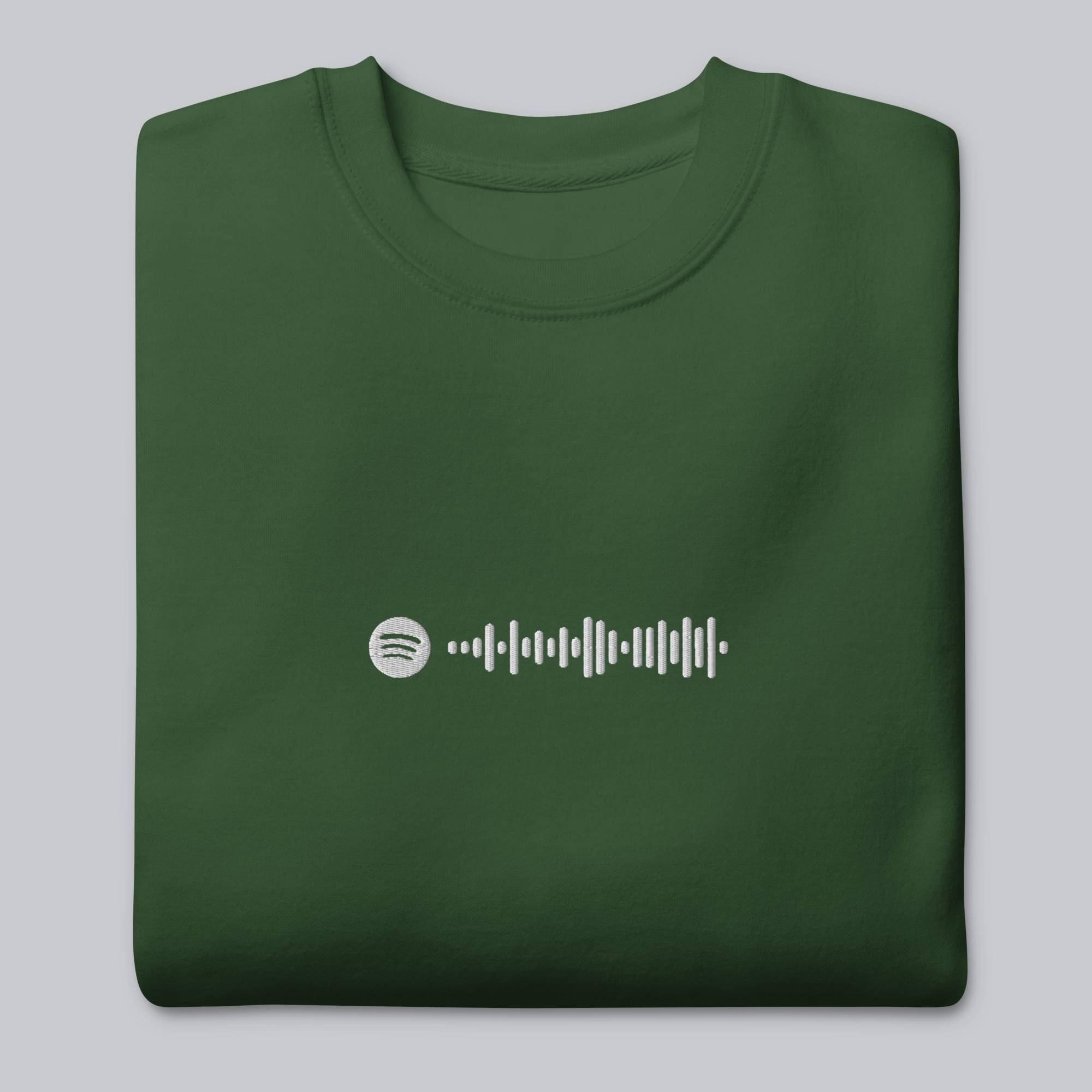 Green long-sleeve shirt with custom Music Code