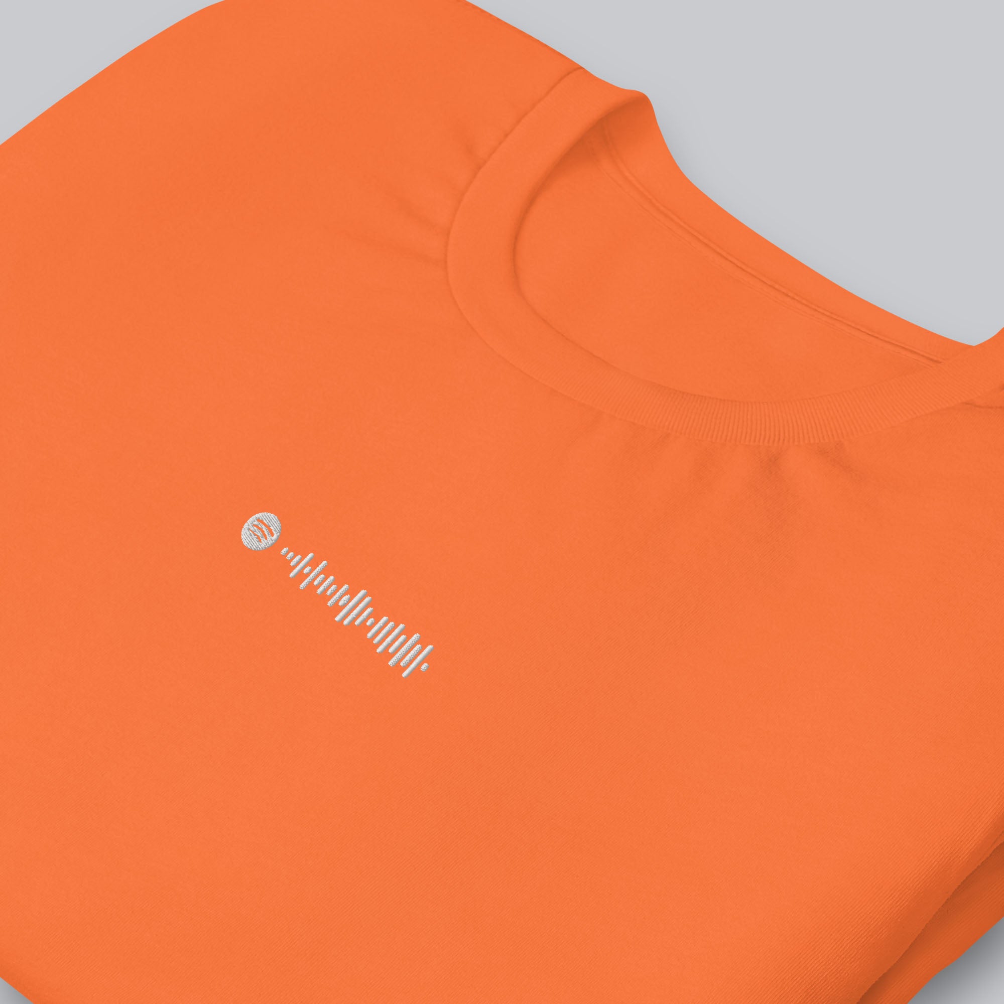 Orange Tshirt with embroidered custom music code