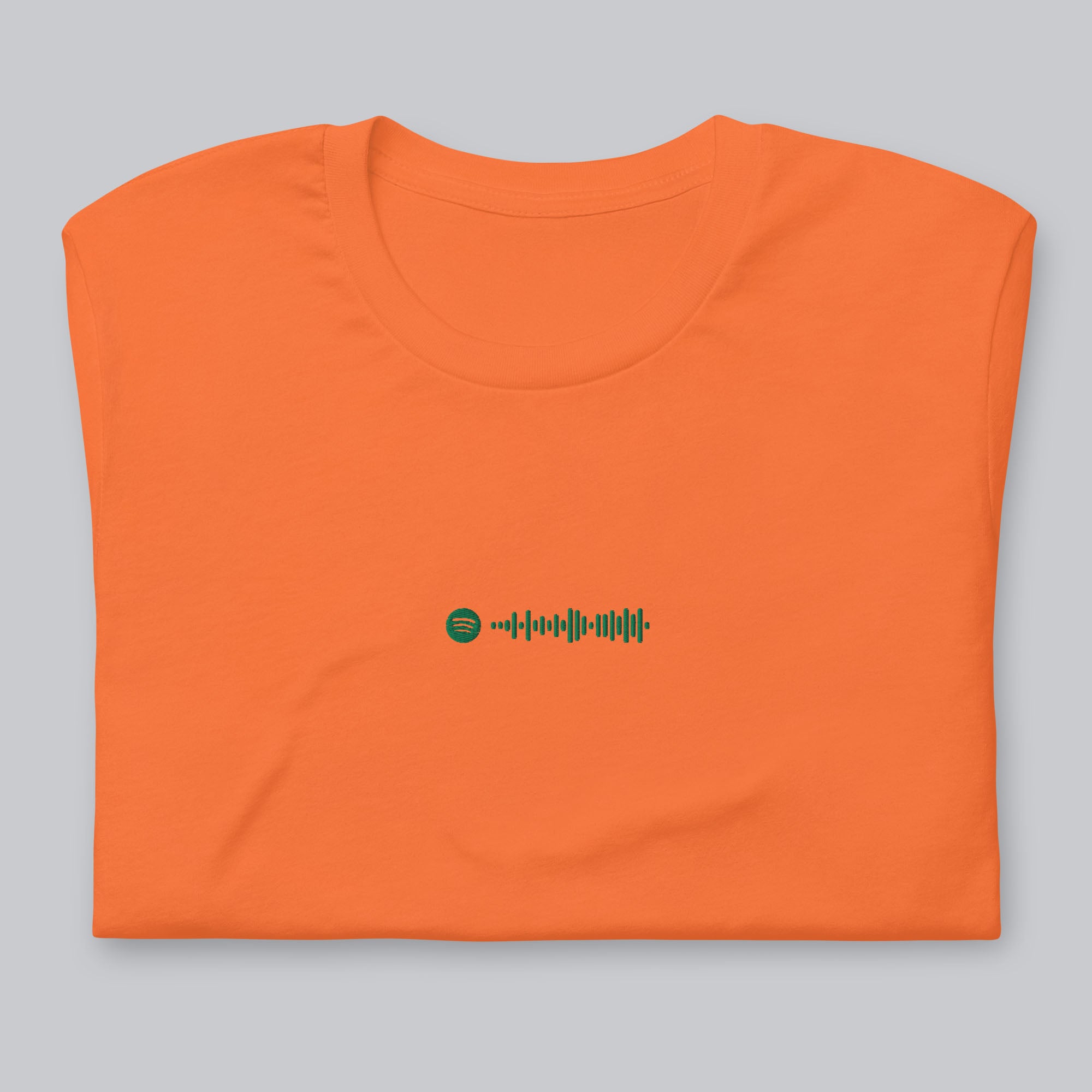 Orange Tshirt with embroidered custom music code