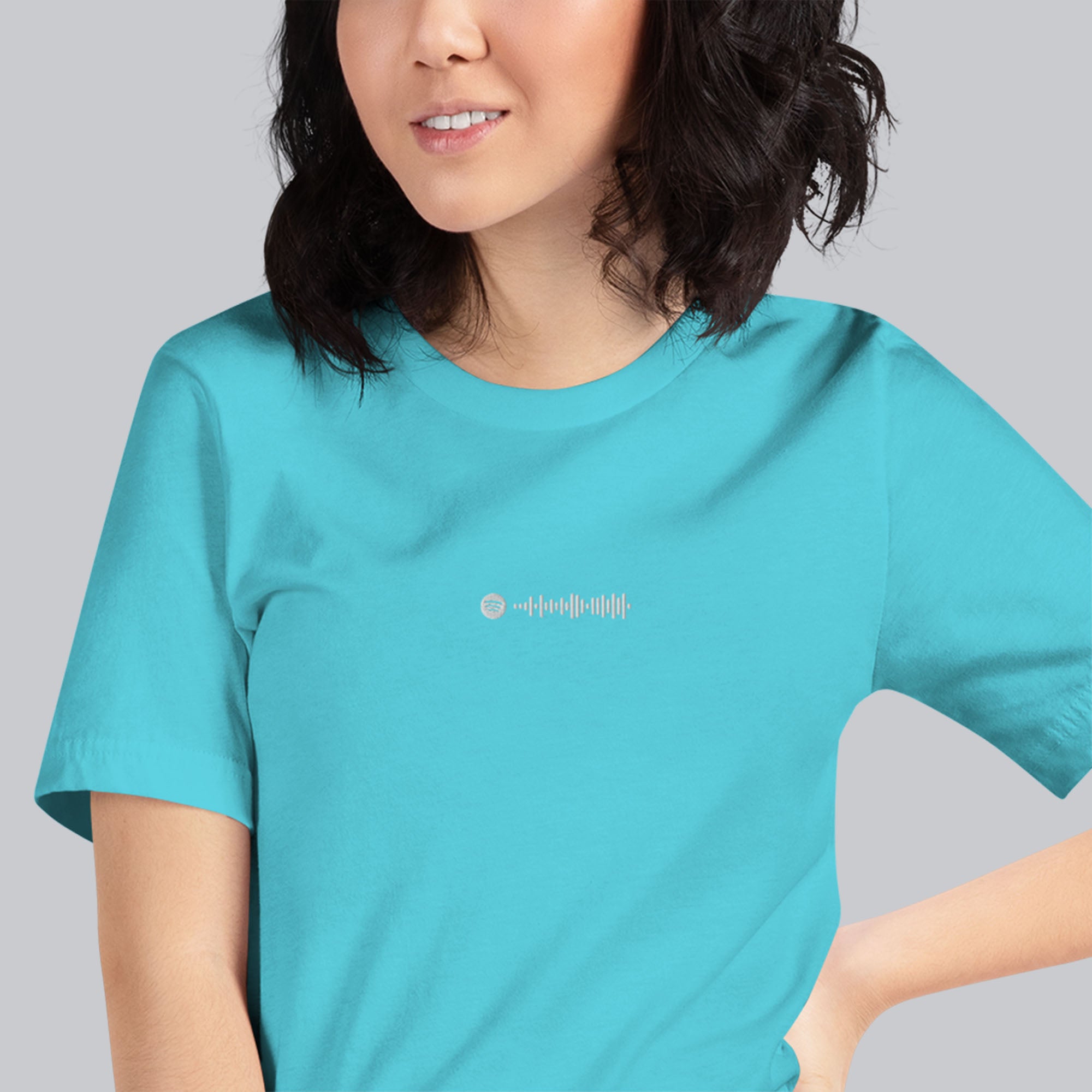 Turquoise Tshirt with embroidered custom music code