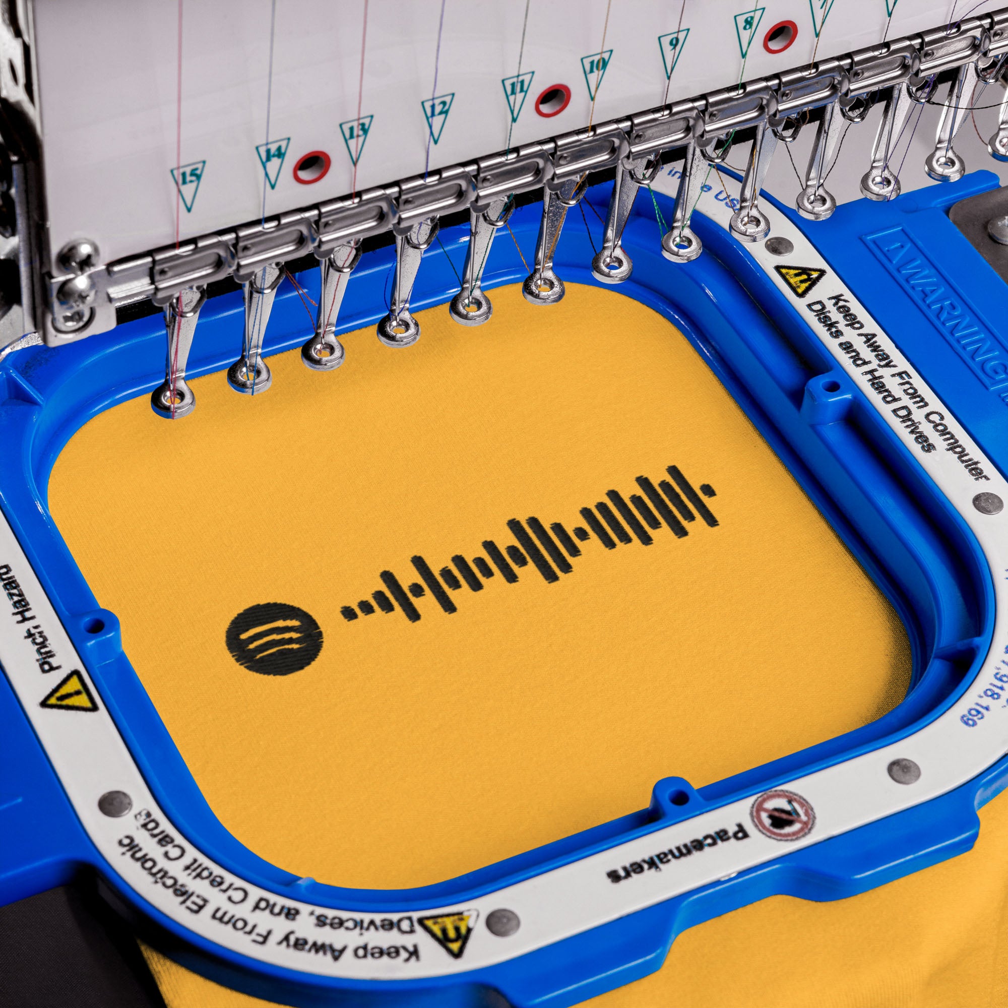 Yellow Tshirt with embroidered custom music code