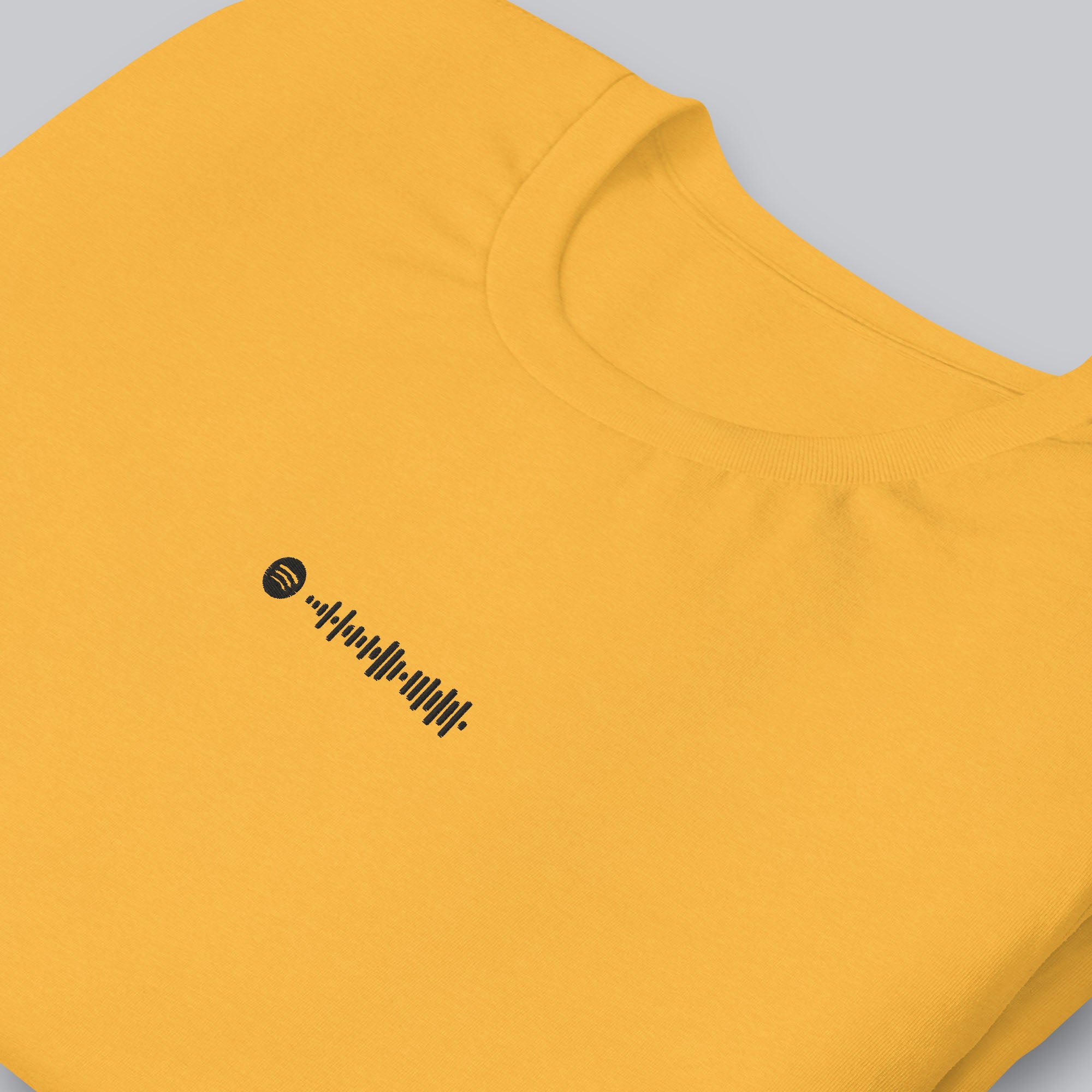 Yellow Tshirt with embroidered custom music code