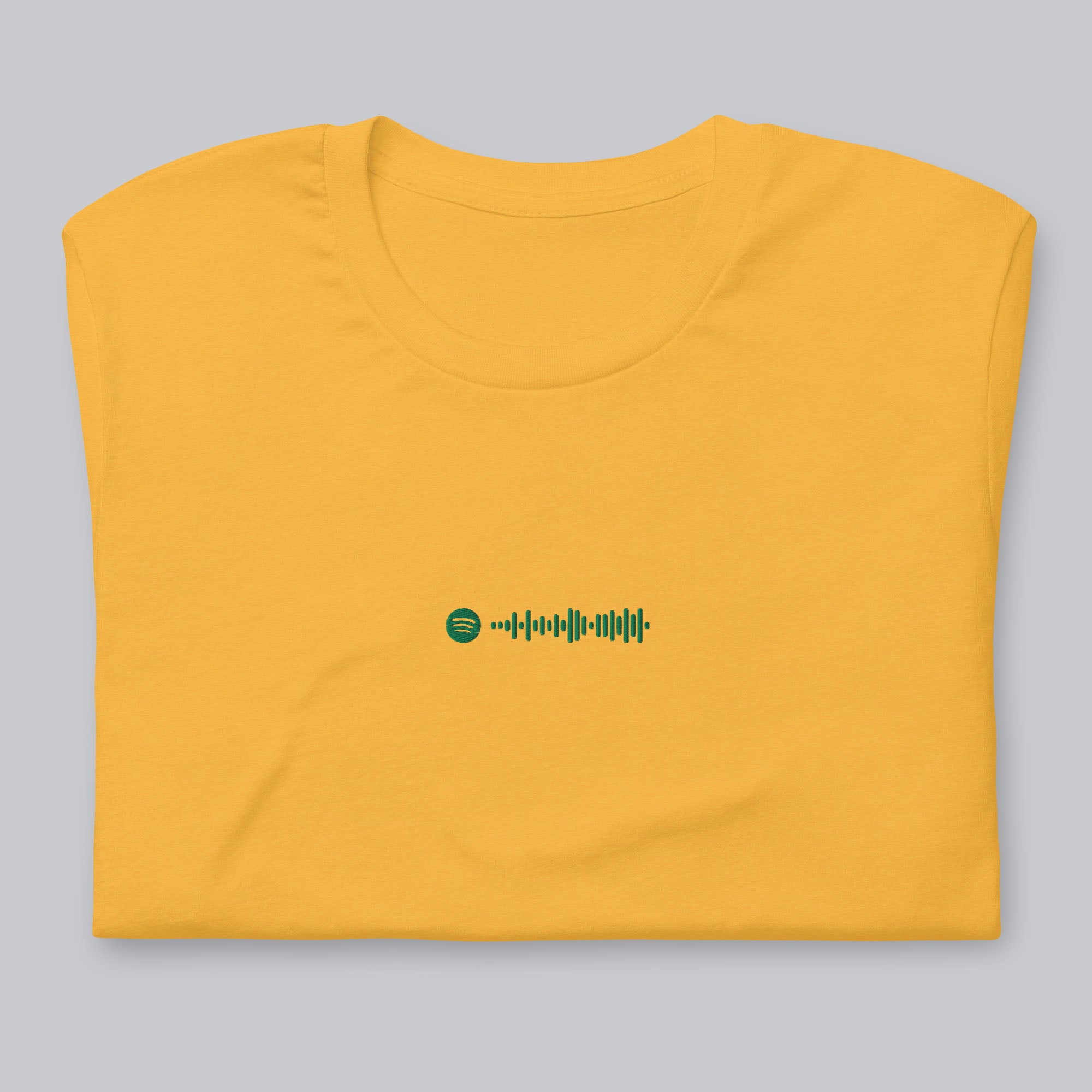 Yellow Tshirt with embroidered custom music code
