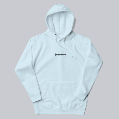 Light blue hoodie with a custom Music Code