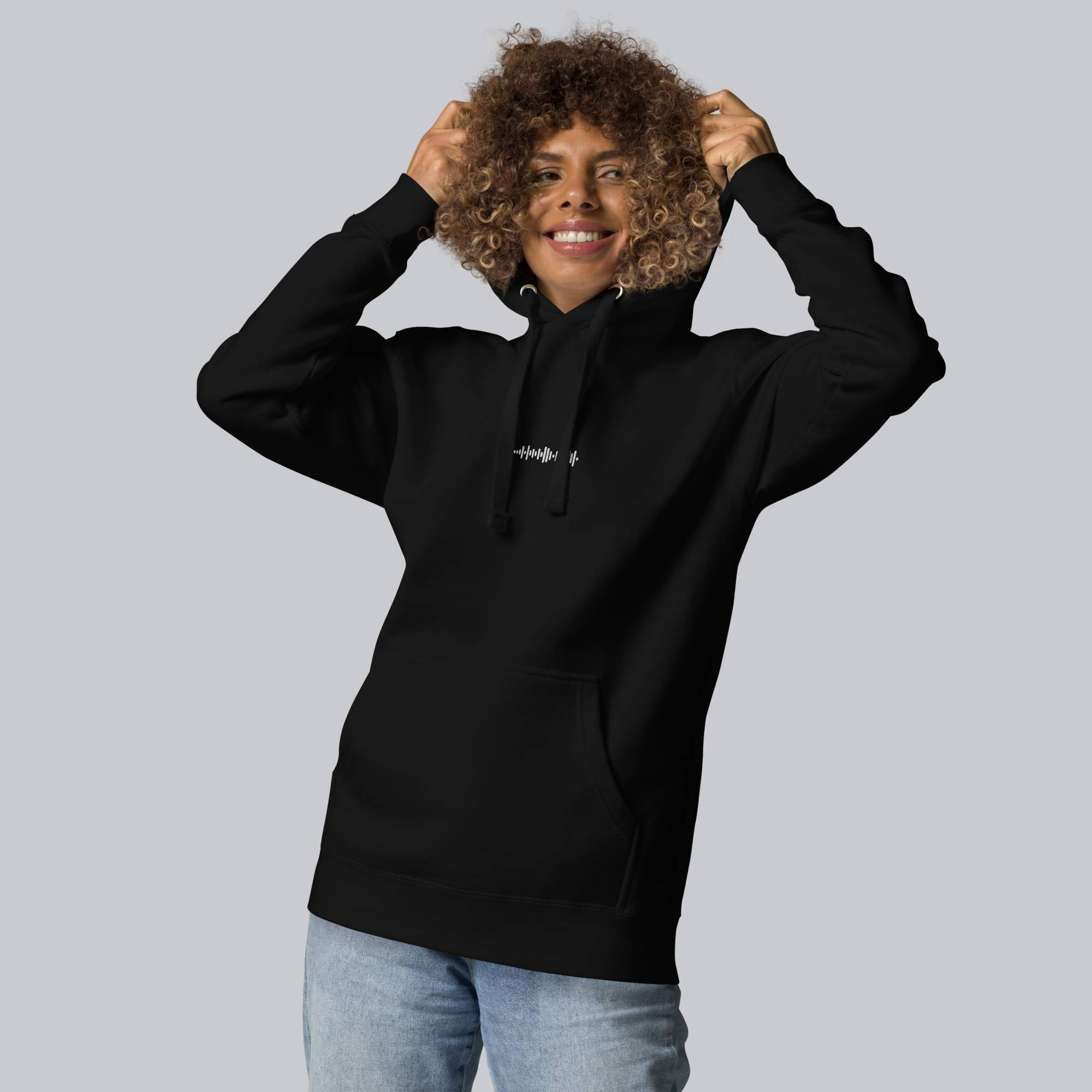 Black hoodie with a custom Music Code