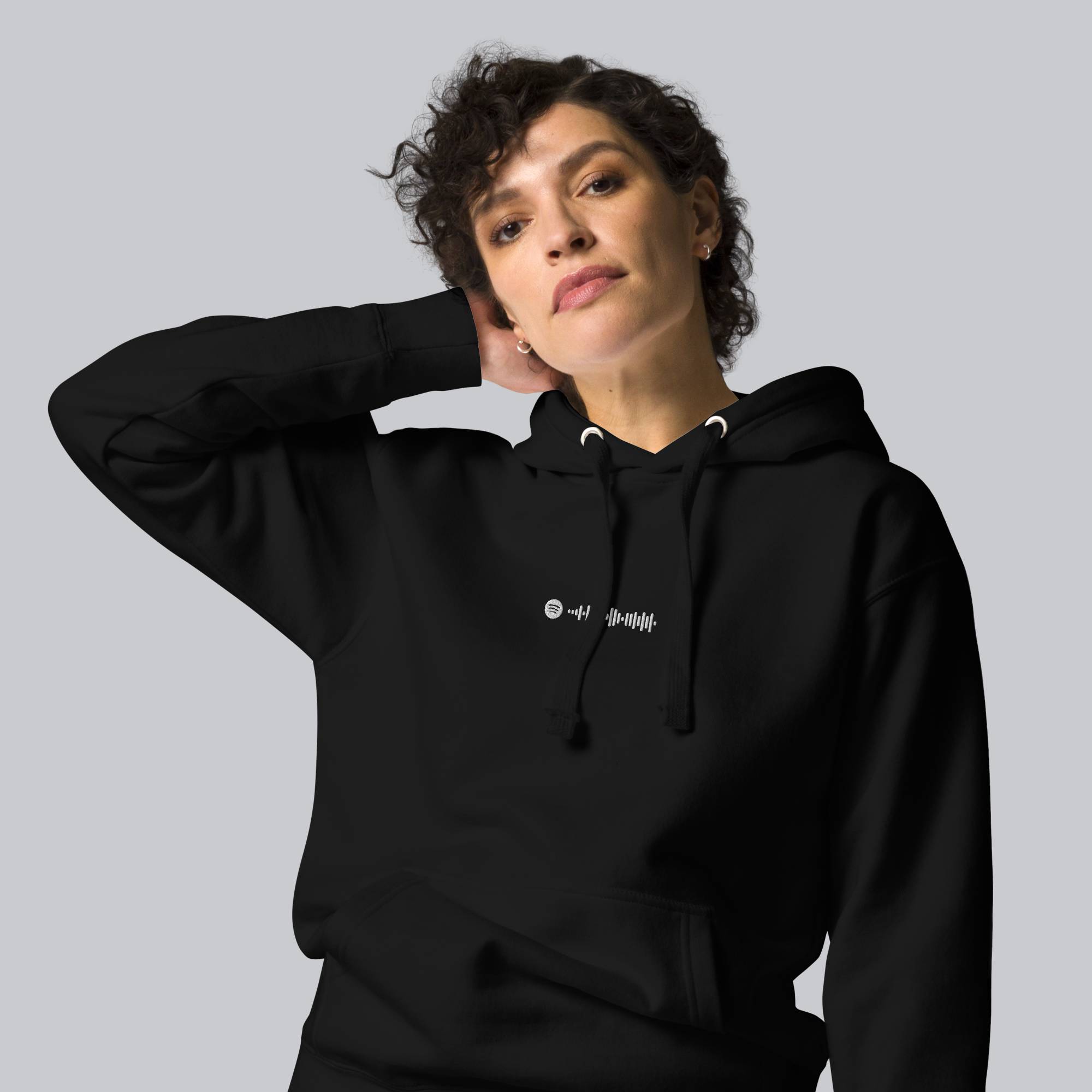 Black hoodie with a custom Music Code