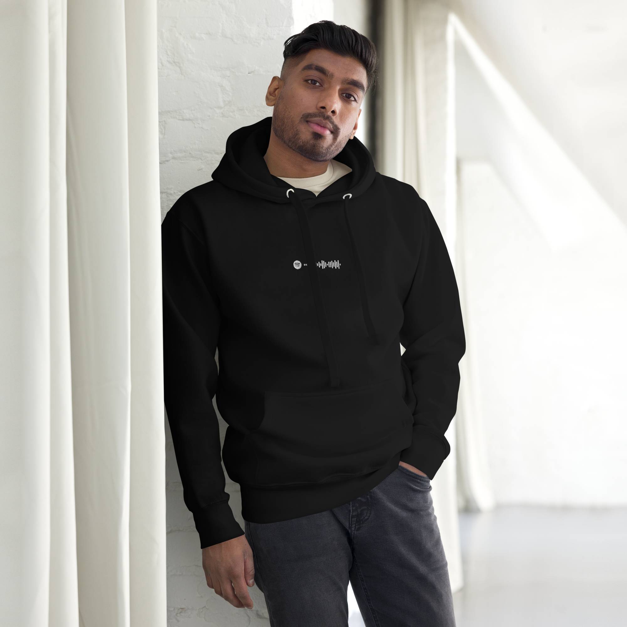 Black hoodie with a custom Music Code