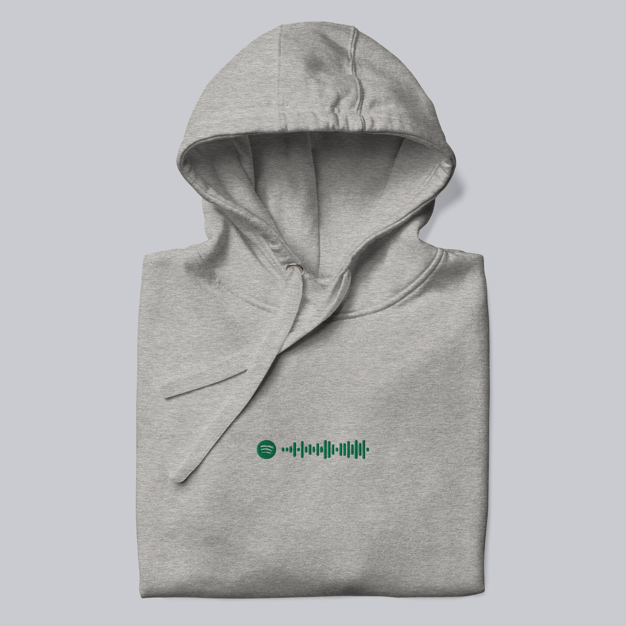 Grey hoodie with a custom Music Code
