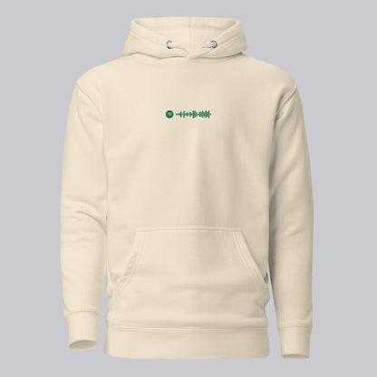 Light yellow hoodie with a custom Music Code