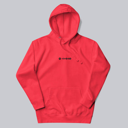 Red hoodie with a custom Music Code
